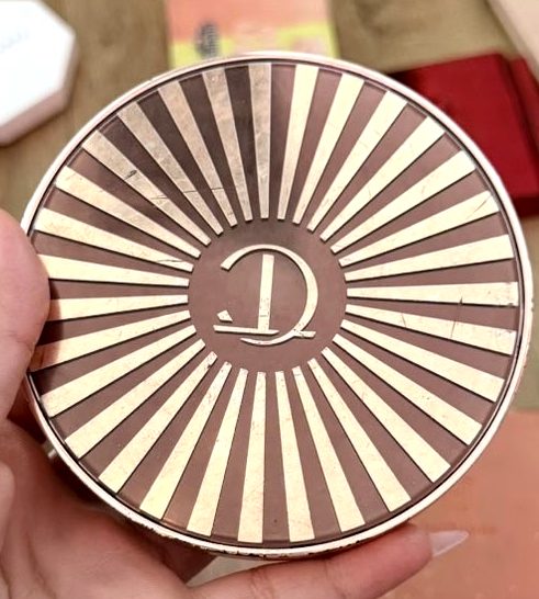 Charlotte Tilbury rose-gold sunburst bronzer compact